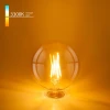 Лампа светодиодная филаментная Elektrostandard E27 6W 3300K прозрачная a048264 Лампа светодиодная филаментная Elektrostandard E27 6W 3300K прозрачная a048264